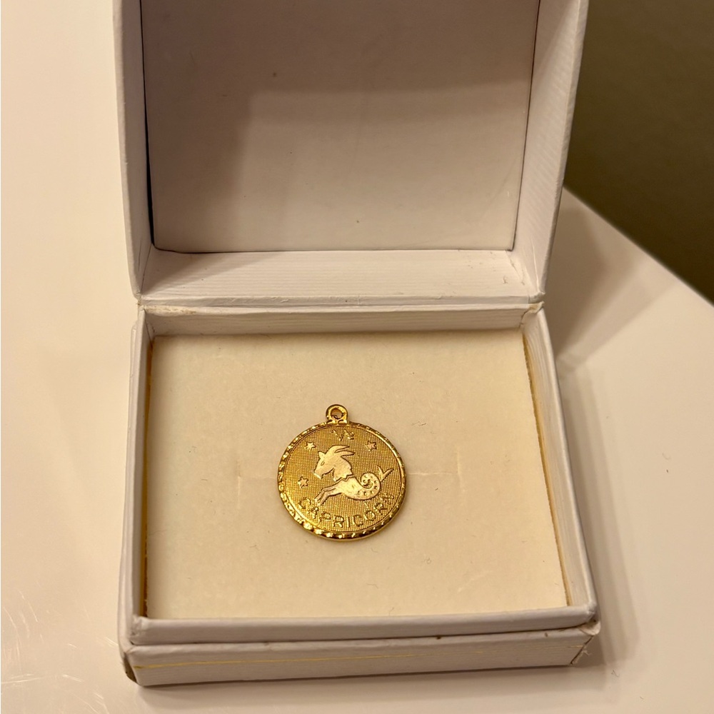3/$30 Capricorn Zodiac Pendant - gold tone